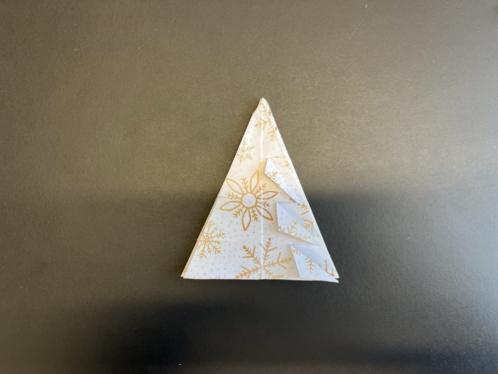 triangle with the branches of the tree folded